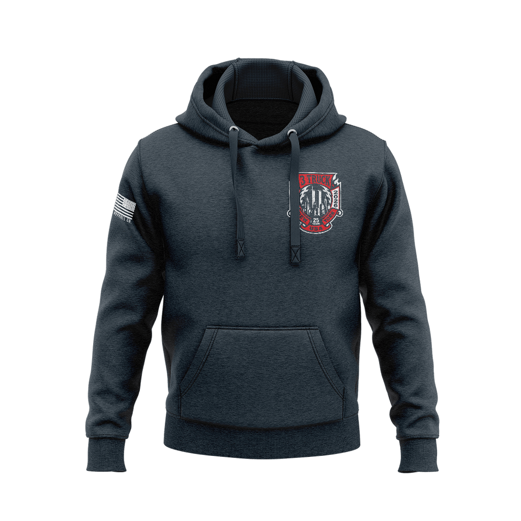 Navy hoodie with a front 3 Truck 25th Anniversary crest graphic and an American flag patch on the right sleeve.