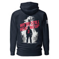 Navy hoodie featuring "We're Still Heading Up" back graphic, 3 Truck firefighter, and American flag sleeve patch.