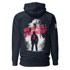Navy hoodie featuring "We're Still Heading Up" back graphic, 3 Truck firefighter, and American flag sleeve patch.