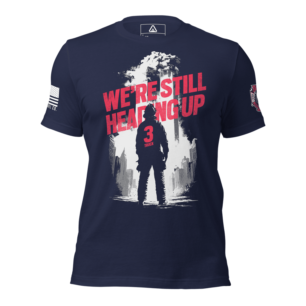 Navy t-shirt front view, with "We're Still Heading Up" front graphic, American flag right sleeve, 3 Truck crest left sleeve.