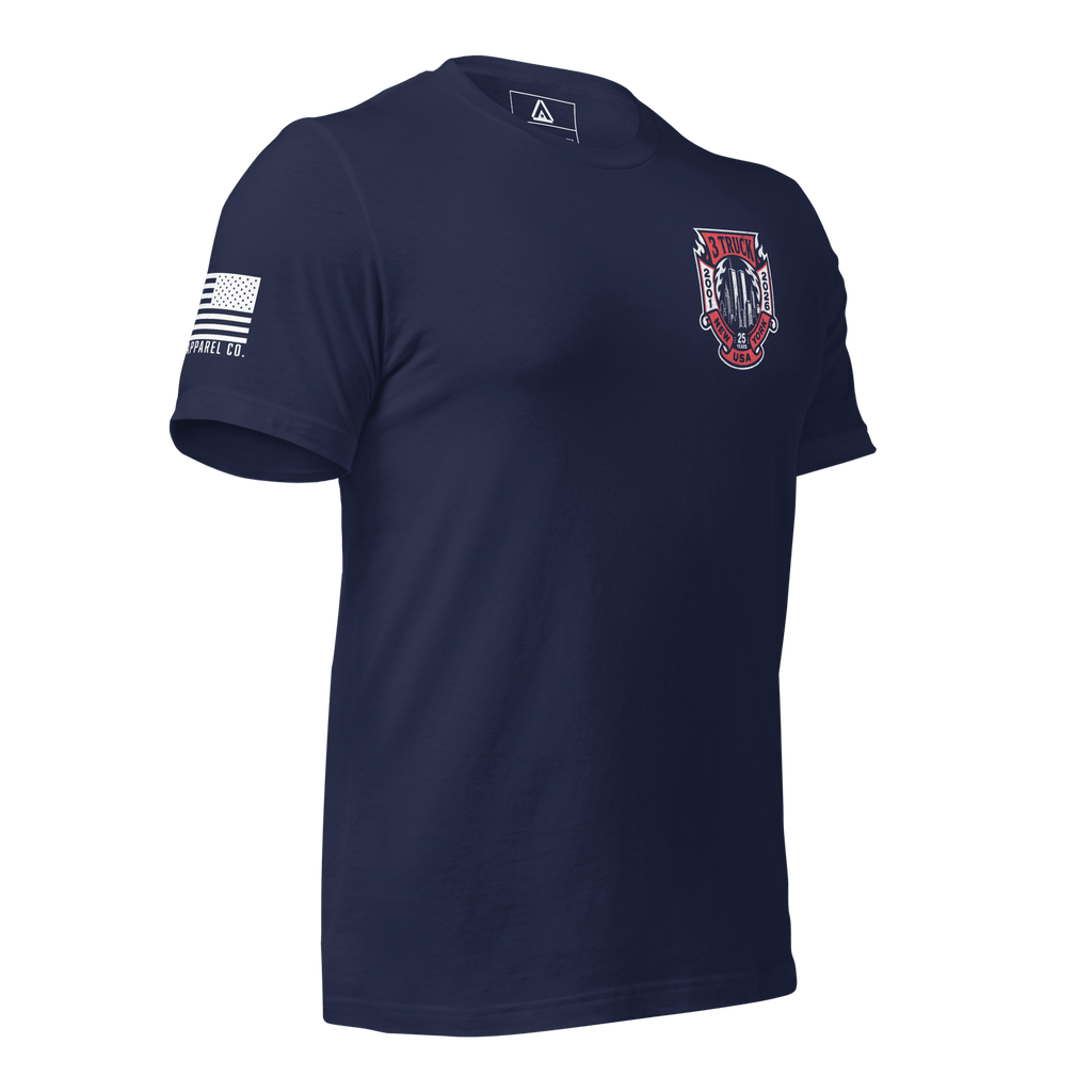 Navy t-shirt, three-quarter view angled right, 3 Truck 25 Years crest left chest print, American flag on right sleeve.