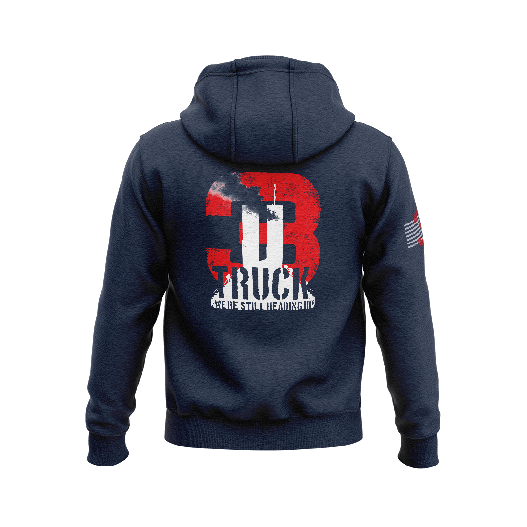 Navy blue hoodie with back "3 TRUCK WE'RE STILL HEADING UP" Twin Towers graphic and a right sleeve flag emblem.   