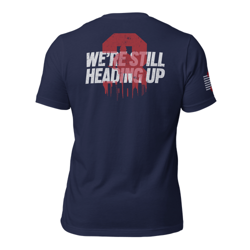 Navy 3 Truck T-shirt back featuring large “We’re Still Heading Up” firefighter emblem and memorial text