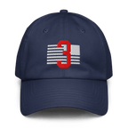 Navy blue baseball cap shown from the front featuring a red number 3 over white stripes like a distressed flag.