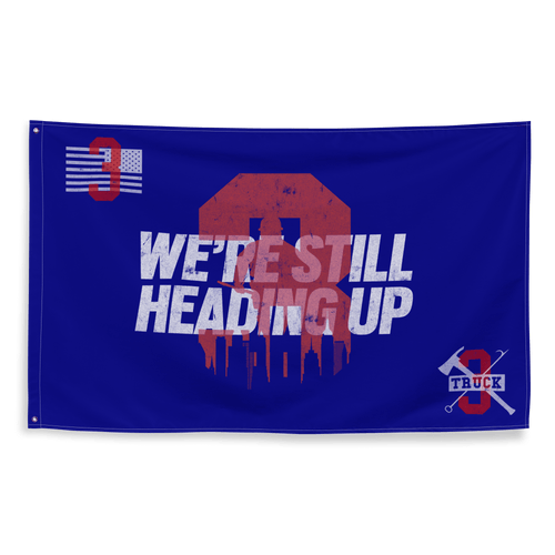 Blue flag featuring a red distressed number 3 with a city skyline and crossed firefighting tools on the corners.