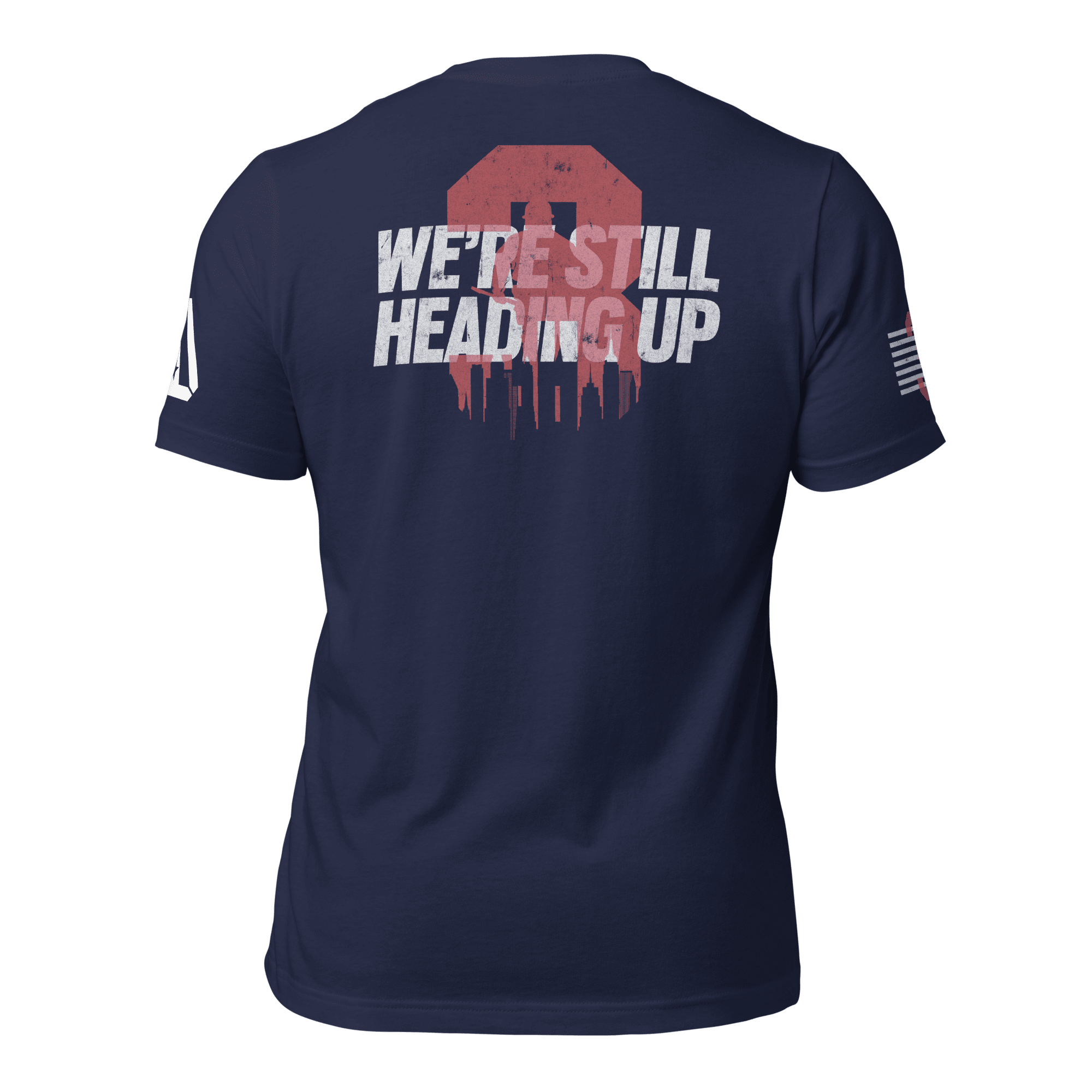 Back of blue T-Shirt with a red dripping "3" over a white city skyline and "WE'RE STILL HEADING UP".