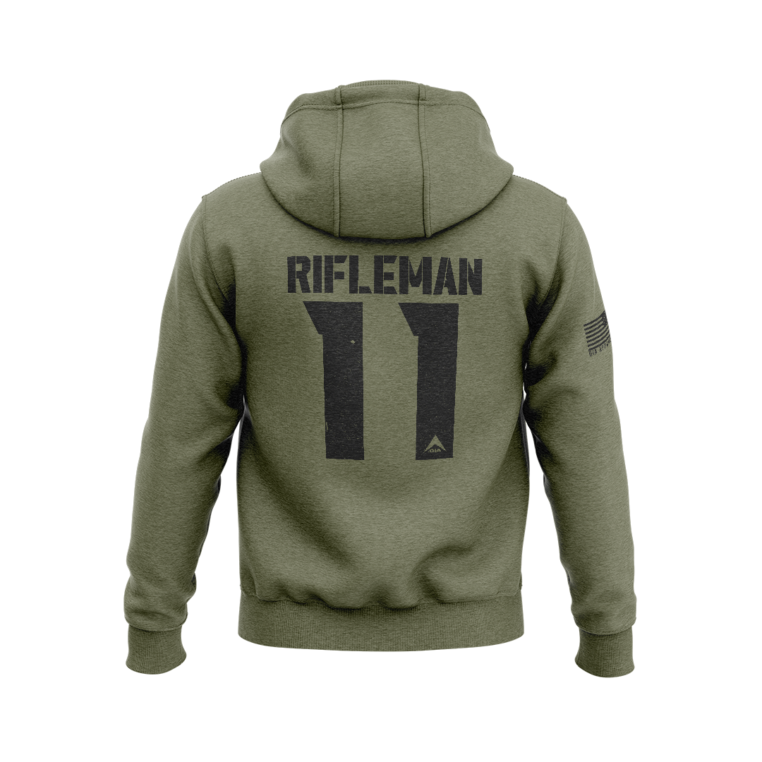Olive green hoodie featuring a black "RIFLEMAN 11" graphic on the back with a right sleeve American flag patch.   