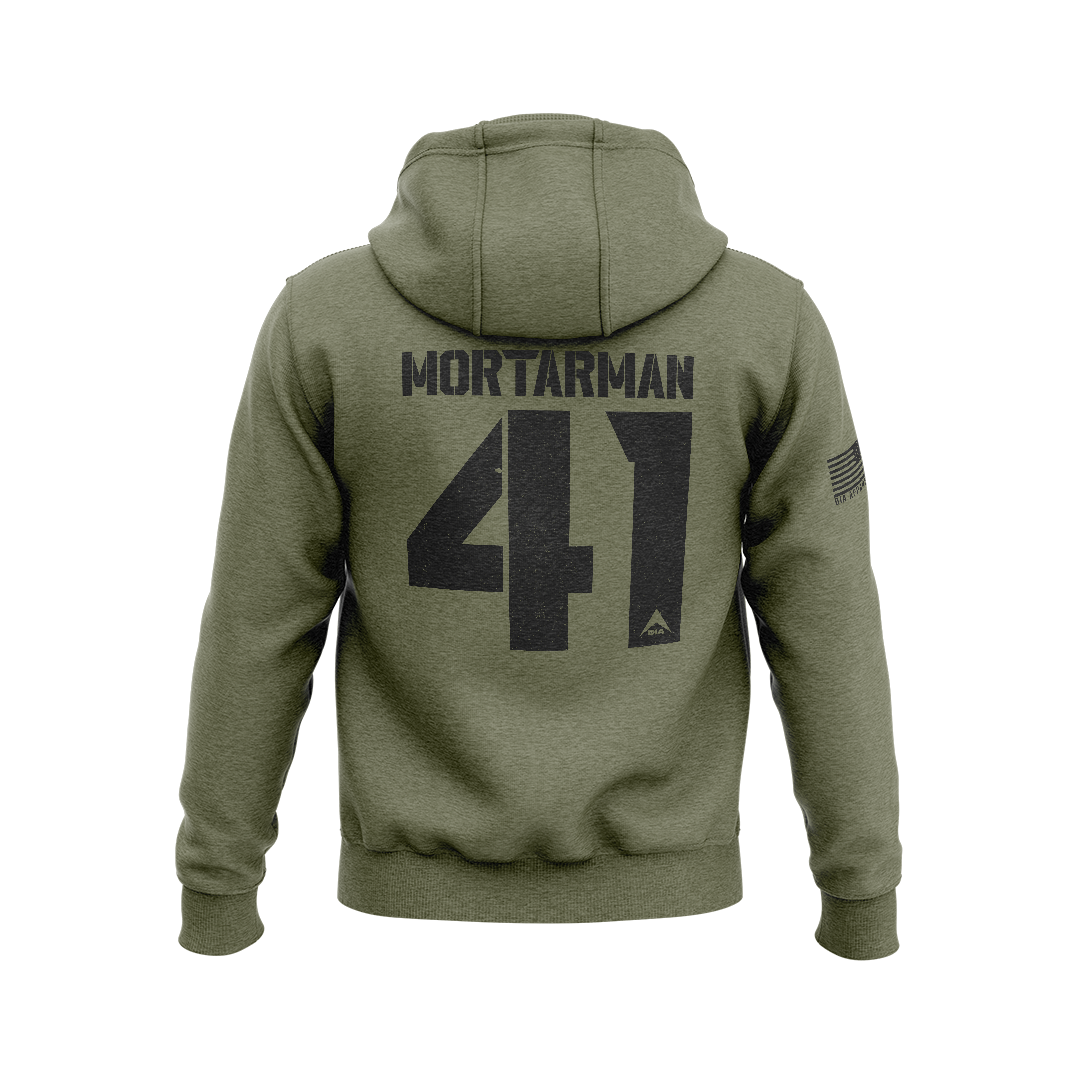 Military green hoodie with back "MORTARMAN 41" graphic, DIA logo, and an American flag patch on the right sleeve.