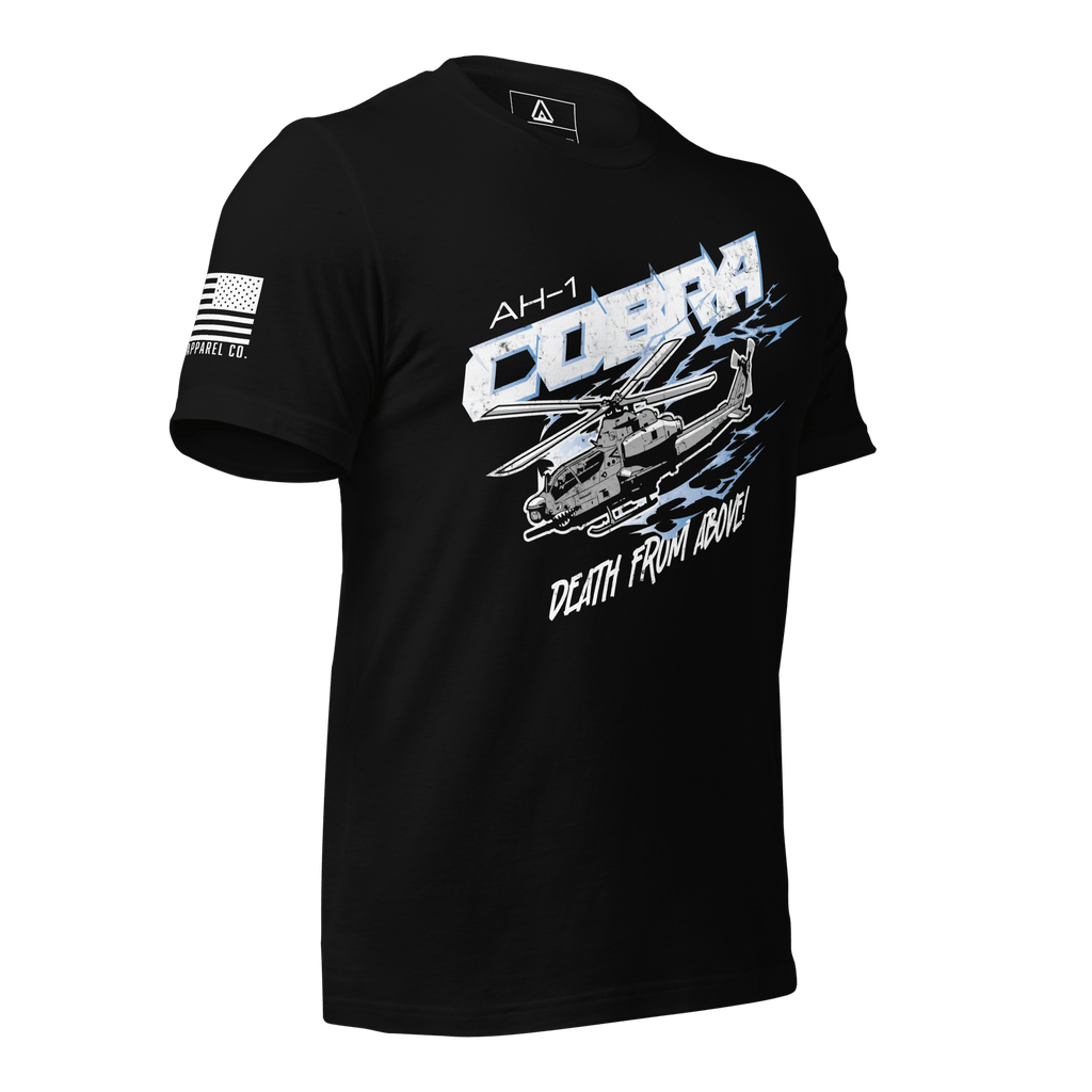 Black t-shirt in a three-quarter view, featuring an AH-1 Cobra graphic and American flag on the sleeve.