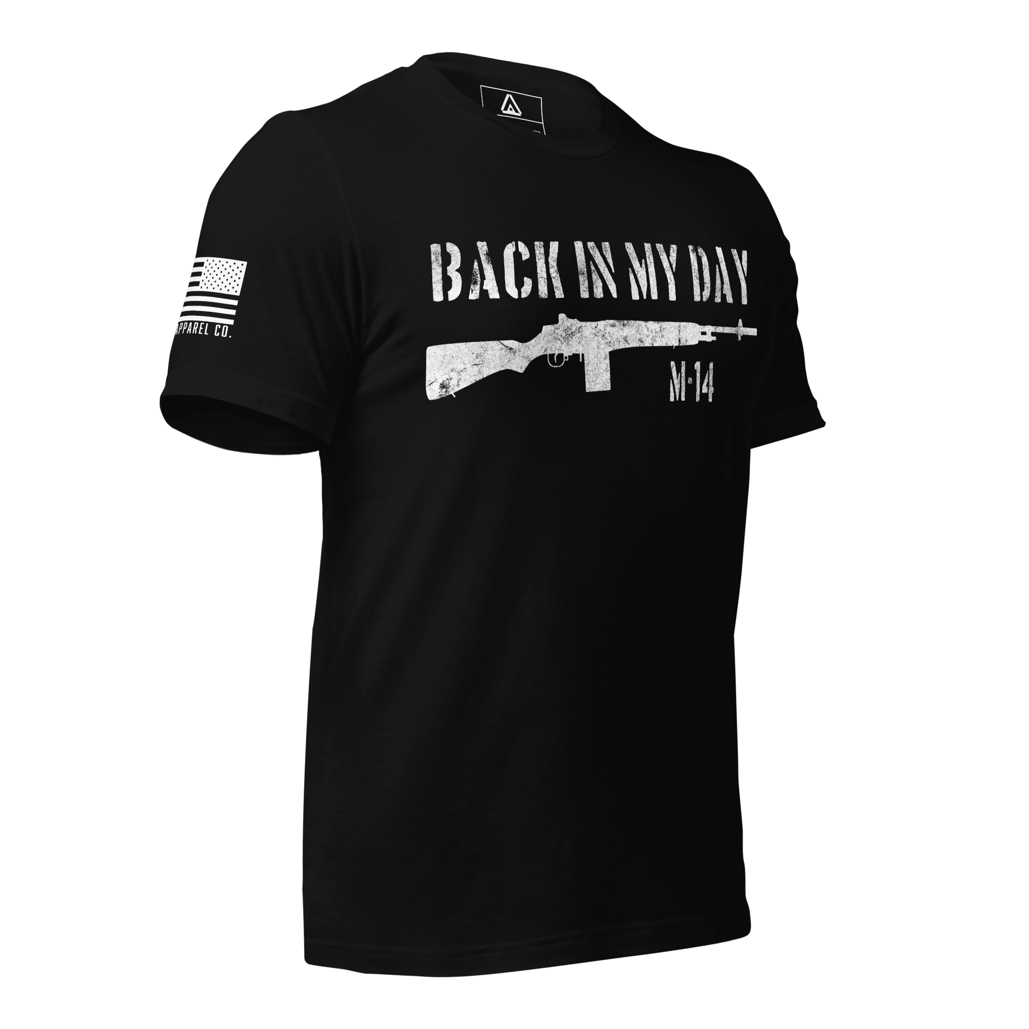 Three-quarter view of a black t-shirt with a distressed rifle graphic, "BACK IN MY DAY M-14" text, and American flag on the sleeve.