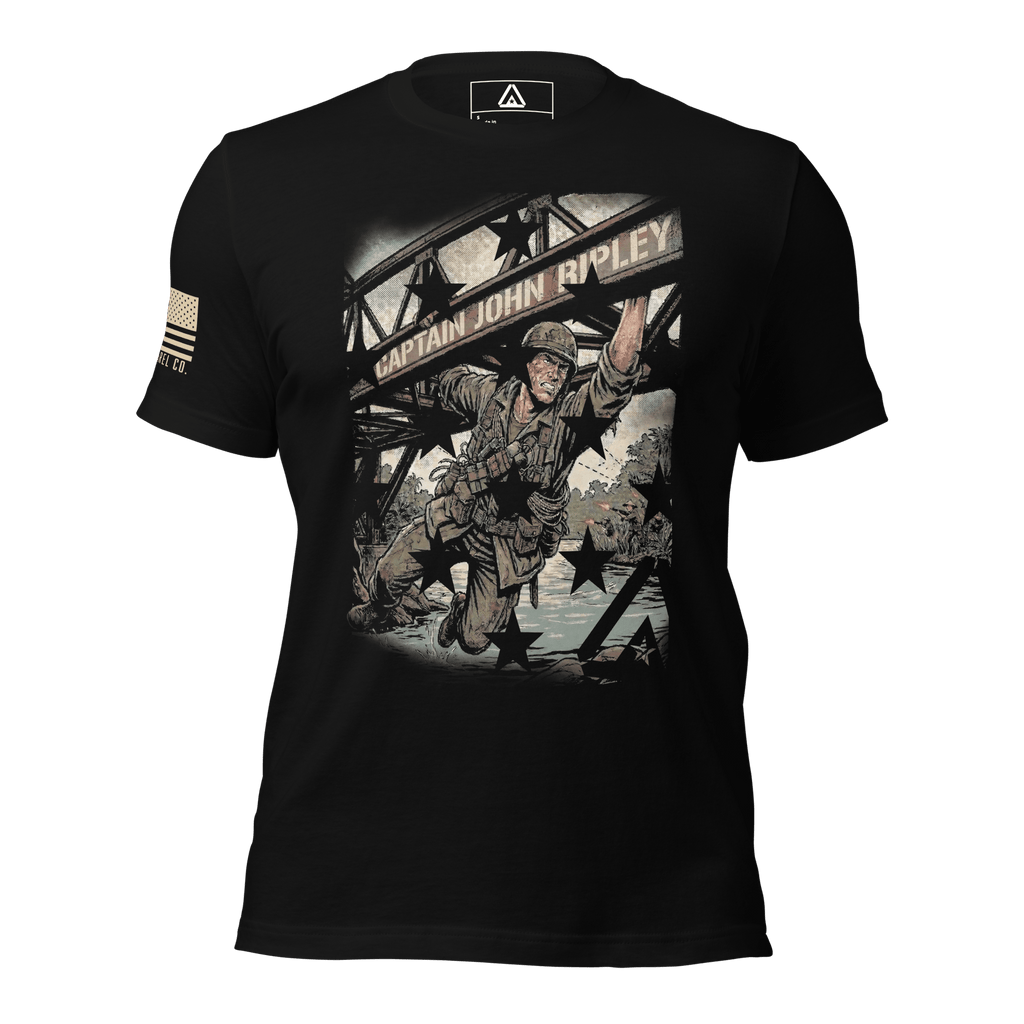 Black t-shirt with a Captain John Ripley graphic on a bridge, with stars overlay and an American flag patch on right sleeve.