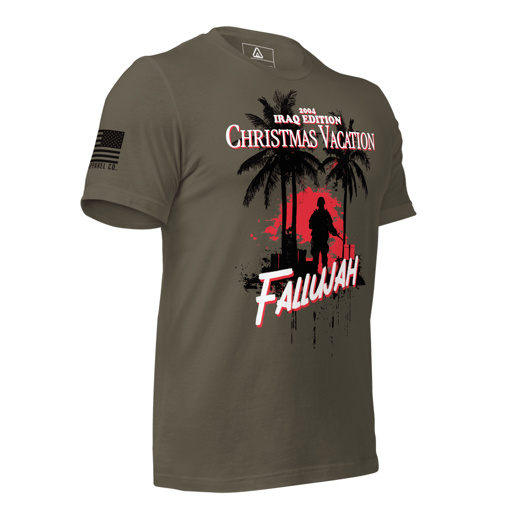 Army green t-shirt angled left featuring a Fallujah Christmas graphic and a black American flag on the sleeve.