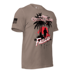 Pebble brown t-shirt angled left featuring a Fallujah Christmas graphic and a black American flag on the sleeve.