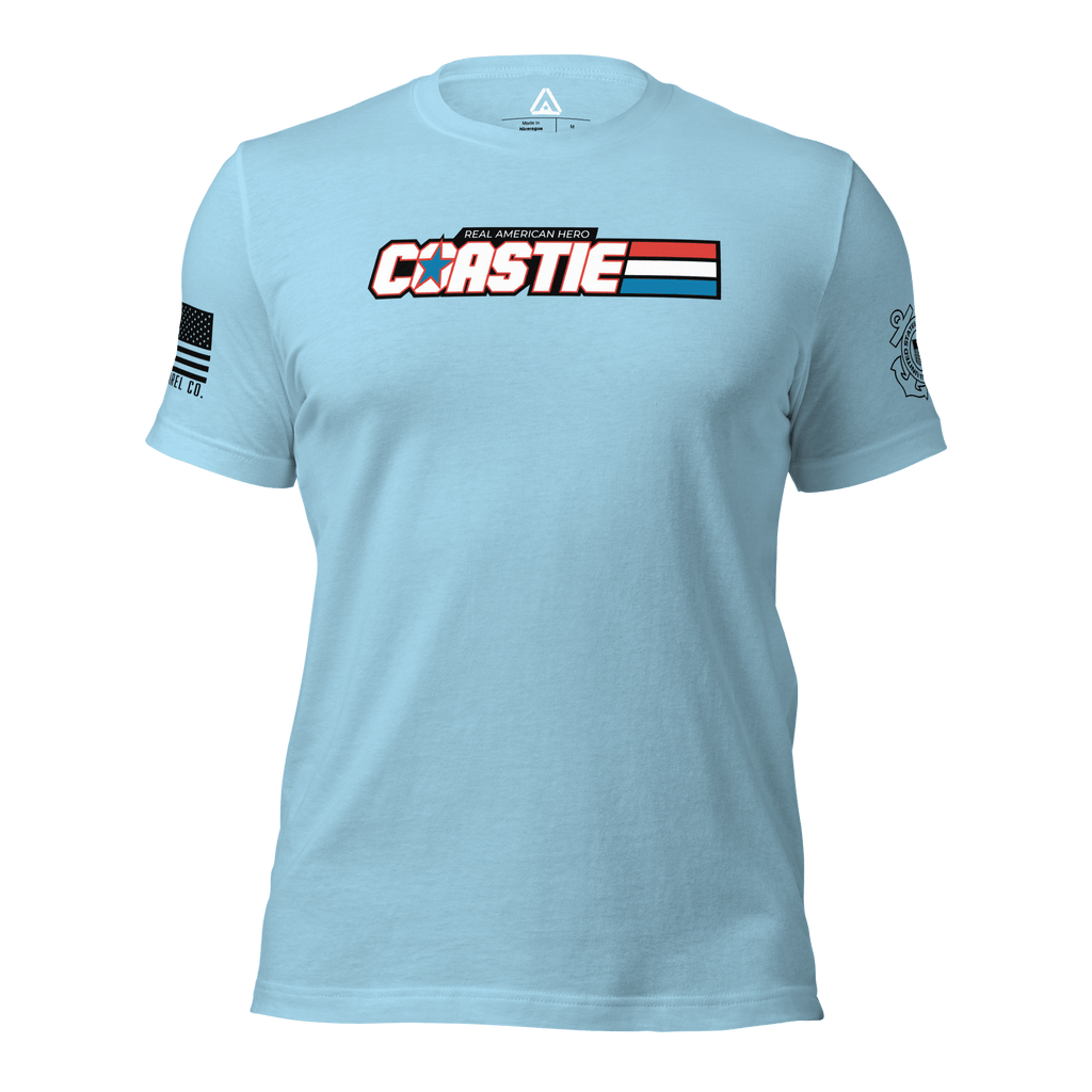 Light blue t-shirt featuring a "COASTIE REAL AMERICAN HERO" chest graphic, an American flag, and a DIA logo.