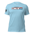 Light blue t-shirt featuring a "COASTIE REAL AMERICAN HERO" chest graphic, an American flag, and a DIA logo.