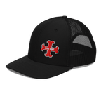 Black trucker hat left side angle with red "DEUS VULT" cross logo and black mesh back.