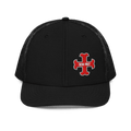 Black trucker hat front with red "DEUS VULT" cross logo and black mesh back.