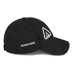 Black distressed cap, right-side view, featuring "GREATNESS AWAITS" text and a white DIA logo on the front.