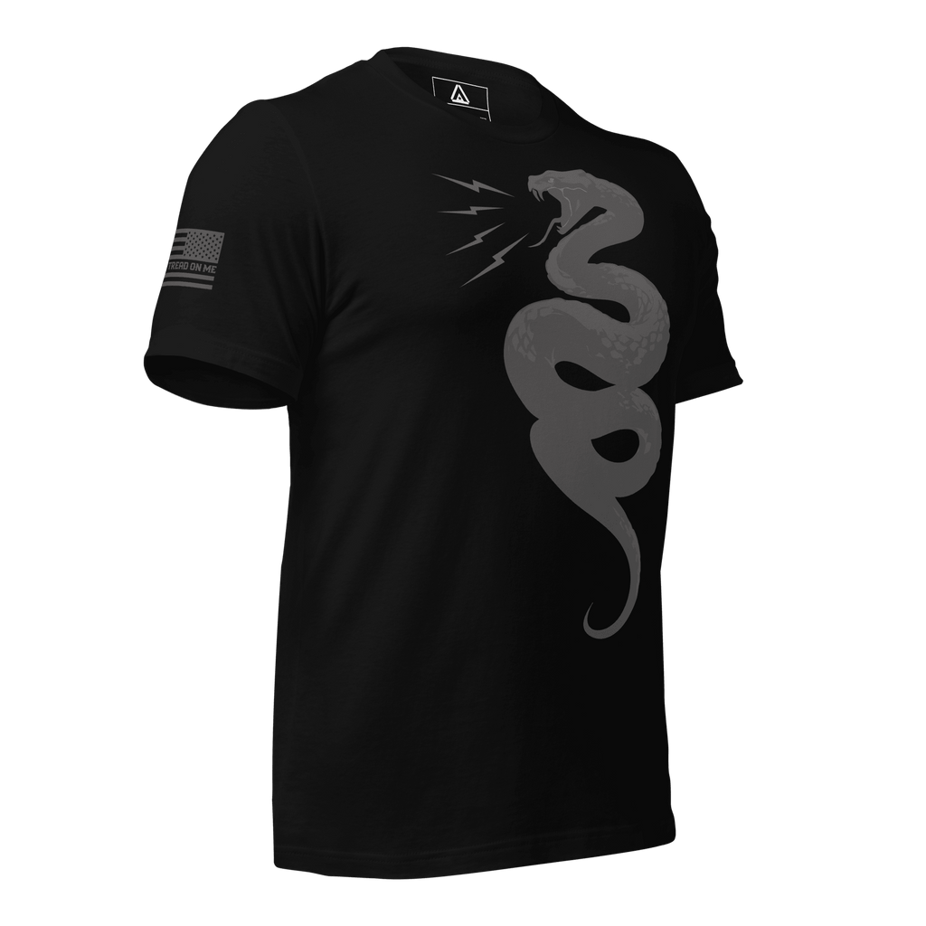 Black t-shirt front with a grey tonal coiled snake and a grey American flag on the sleeve.