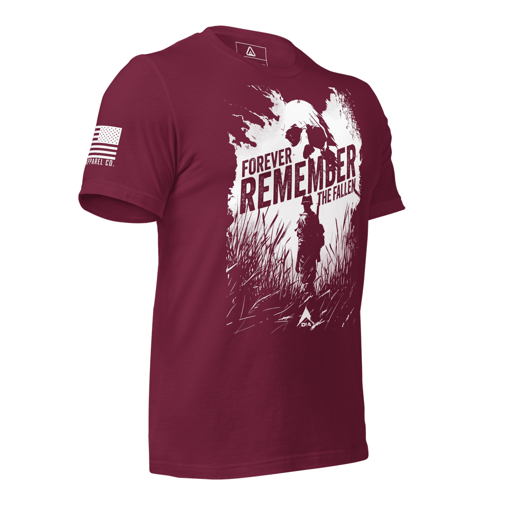 Maroon t-shirt angled left featuring a white "Forever Remember the Fallen" graphic and a white American flag on the sleeve.