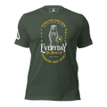 green t-shirt, front view, featuring a standing bear graphic, the text "STAND FOR SOMETHING," and a DIA logo.