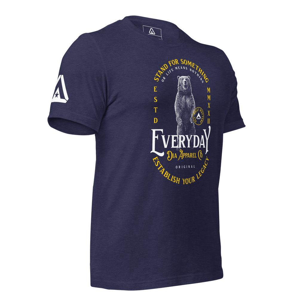 Heather midnight blue t-shirt, three-quarter view angled to the left, featuring a bear graphic and a DIA logo.