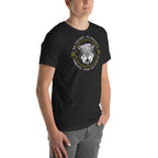 Angled left view of a man wearing a black heather wolf graphic t-shirt featuring "No Excuses. No Regrets" text.