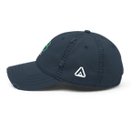 Navy blue distressed cap, shown from a left-side view, featuring a white DIA logo and a green shamrock on the front.