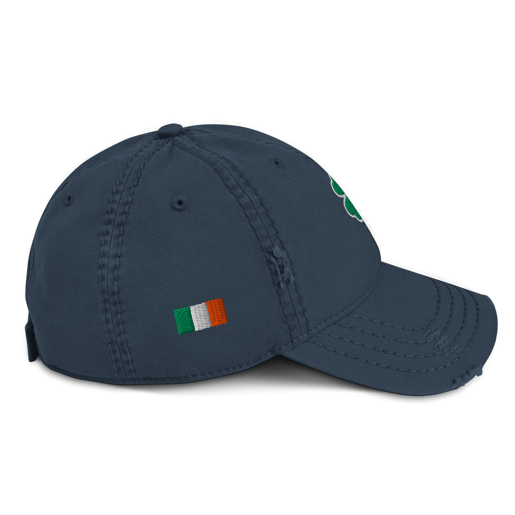 Navy blue hat shown from a right side view, with a green four-leaf clover, and a small Irish flag patch.
