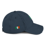 Navy blue hat shown from a right side view, with a green four-leaf clover, and a small Irish flag patch.