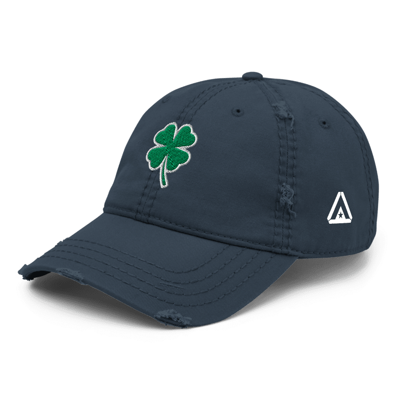 Navy blue distressed cap, angled right, featuring a green shamrock and white DIA logo on the side.