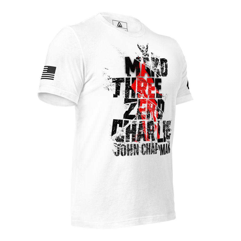 White t-shirt, angled toward the left, with "MAKO THREE ZERO CHARLIE" text, and American flag graphic.
