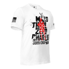 White t-shirt angled right, featuring distressed "Mako Three Zero Charlie John Chapman" text with American flag sleeve patch.