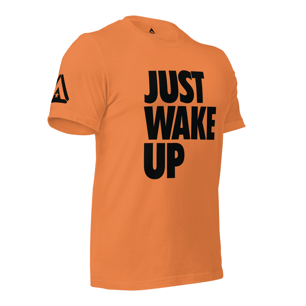 Burnt orange t-shirt, three-quarter view angled to the left, featuring "JUST WAKE UP" text and a DIA logo.