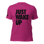 Magenta t-shirt, front view, featuring the text "JUST WAKE UP" in a bold black font and a DIA logo.