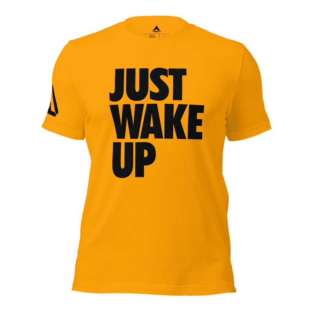 Gold t-shirt, front view, featuring the text "JUST WAKE UP" in a bold black font and a DIA logo.