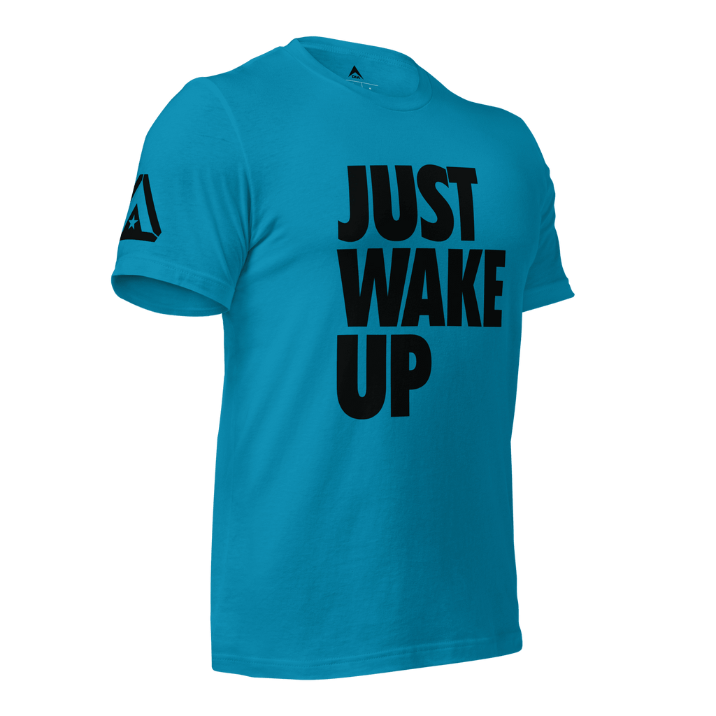 Bright blue t-shirt, three-quarter view angled to the left, featuring "JUST WAKE UP" text and a DIA logo.
