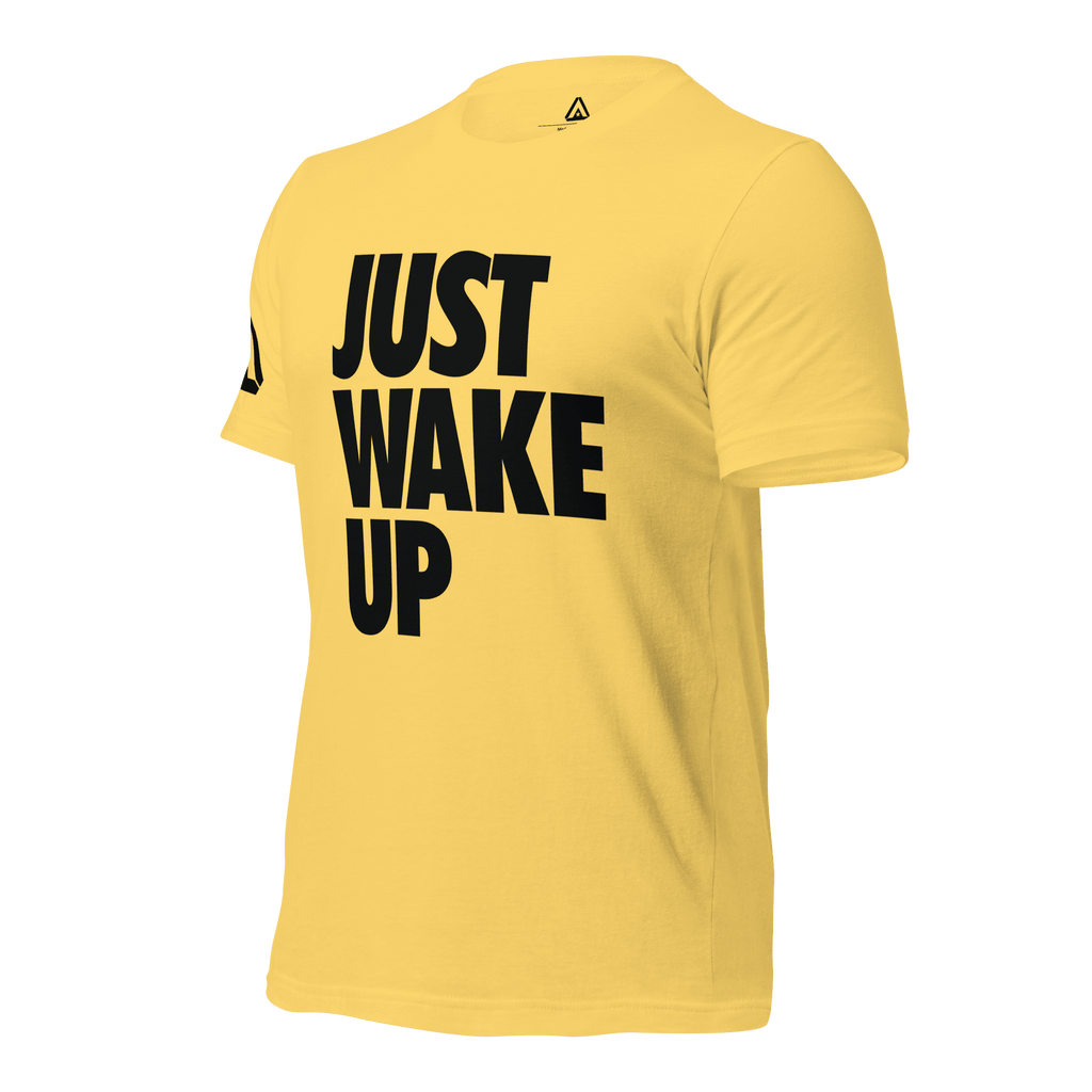 Yellow t-shirt, three-quarter view angled to the right, featuring the text "JUST WAKE UP"