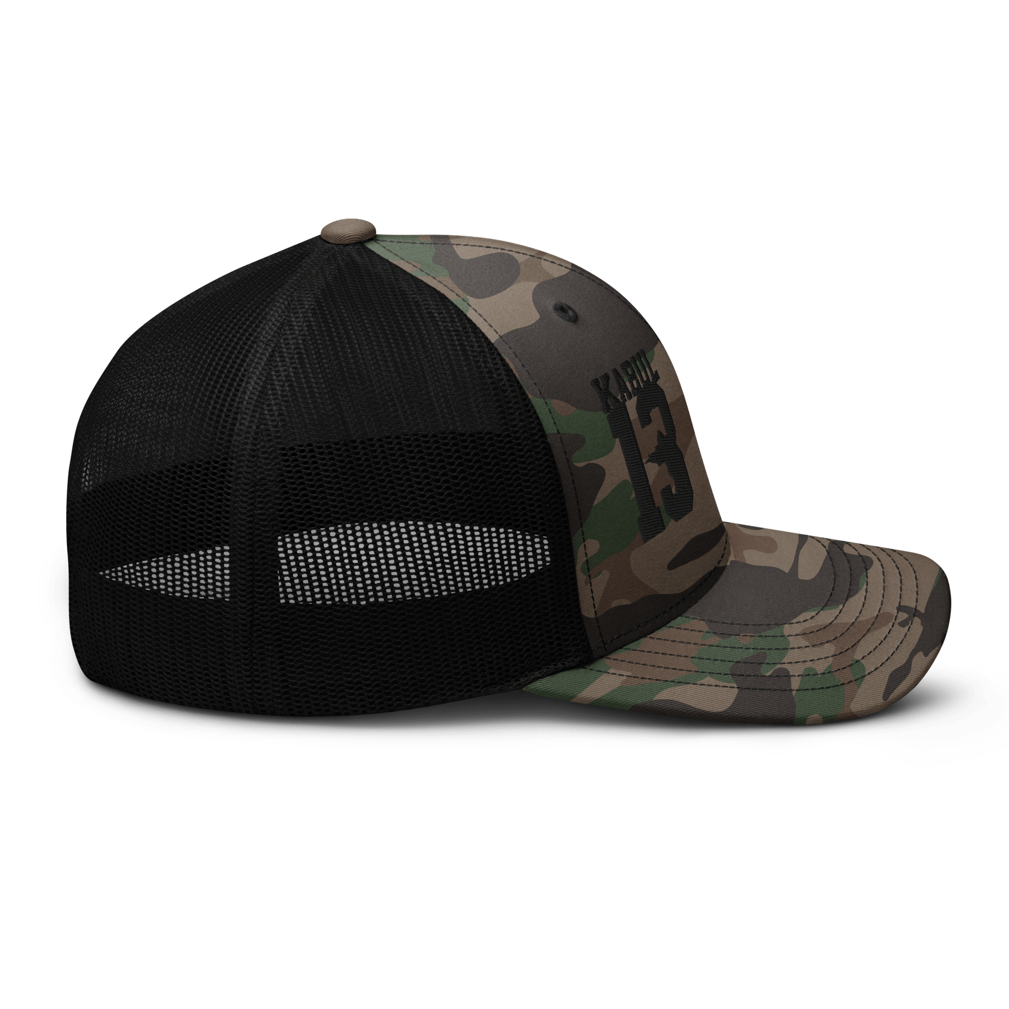 Black/Camo Abbey Gate Trucker Hat shown at a right-side profile highlighting patch embroidery and stitching