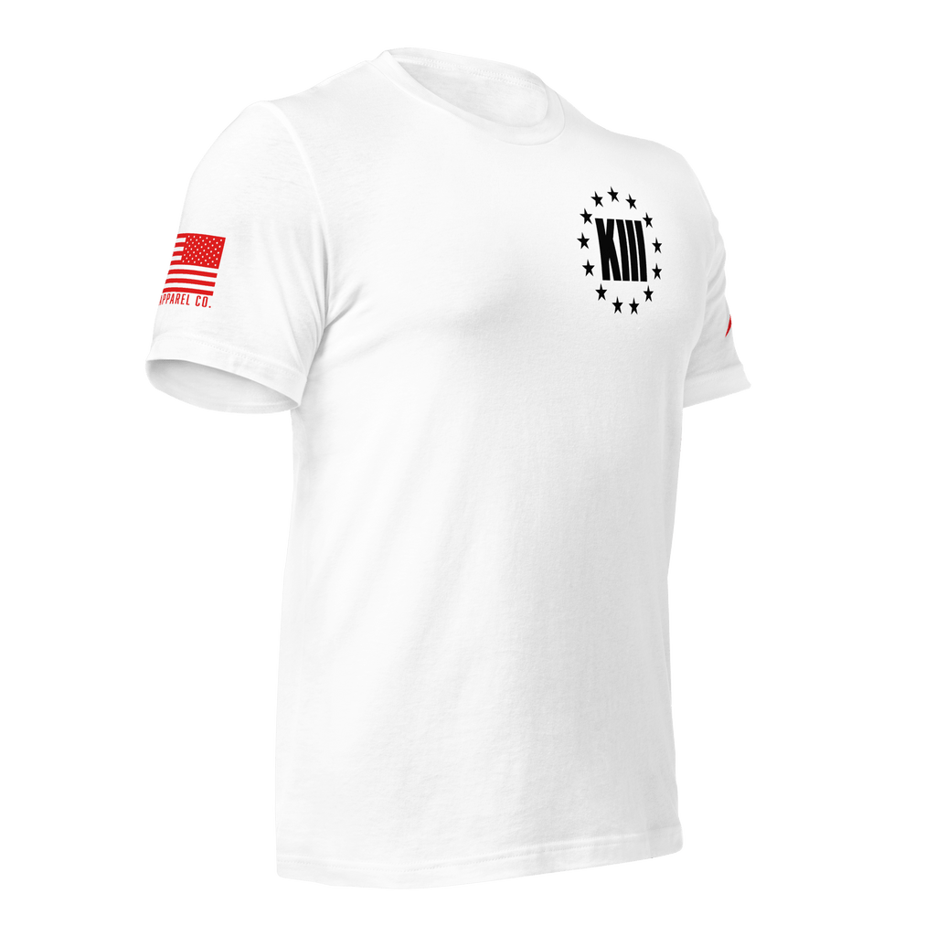 White t-shirt angled left featuring a black "XIII" with stars and a red DIA logo on the sleeve.