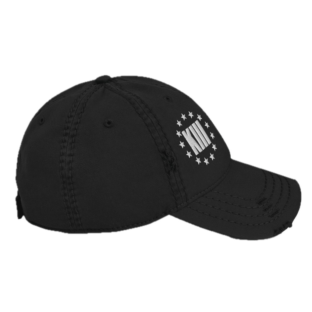 Black distressed ball cap at a side angle with a white "KXIII" logo surrounded by stars.