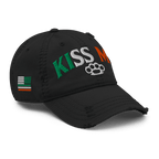 Black distressed ball cap, angled left, with "KISS ME" text and an Irish-American flag graphic on the side.