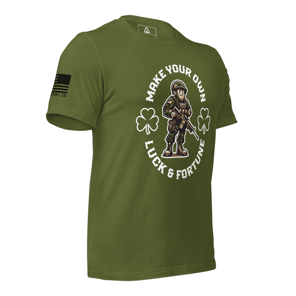 Olive green t-shirt, three-quarter view angled left, with a leprechaun soldier, shamrocks, and American flag graphic.