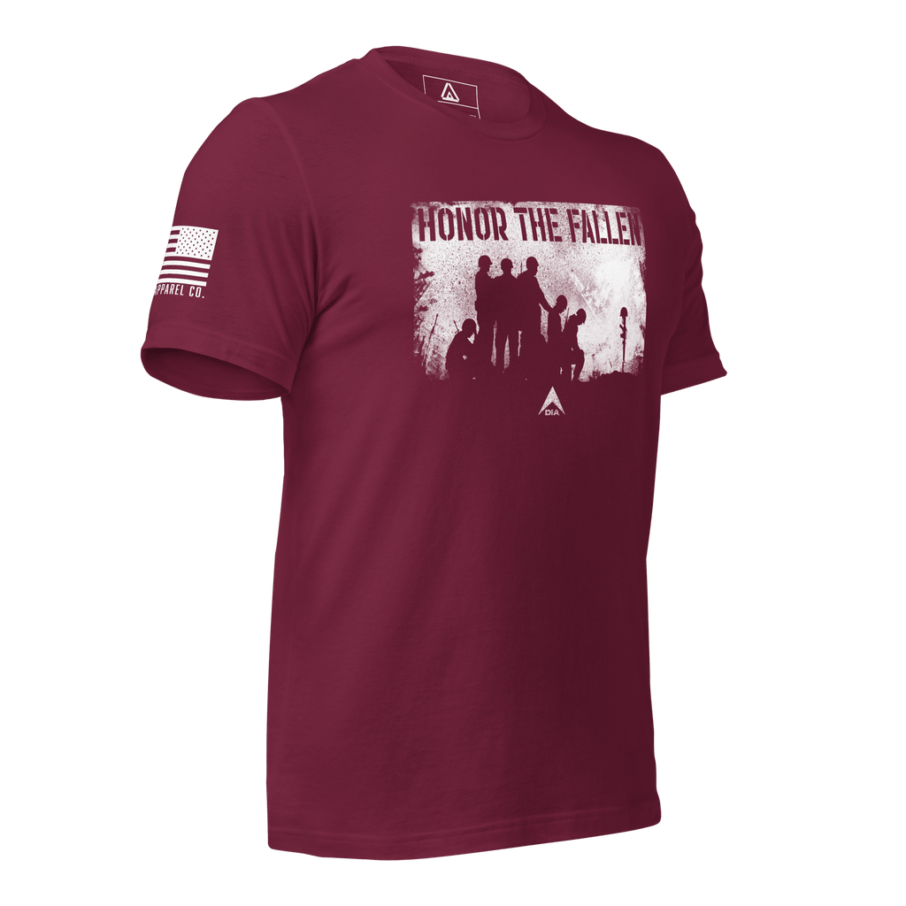 Maroon t-shirt shown angled left, with white distressed "HONOR THE FALLEN" soldiers graphic on the chest and a DIA logo.