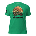 Heather kelly green t-shirt featuring a military jeep in front of a desert sunset graphic and "dia apparel co." text
