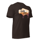 brown t-shirt, three-quarter view angled left, featuring a "Roam Free" buffalo graphic