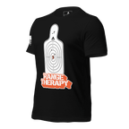 Black t-shirt angled left with a white target graphic, orange "RANGE THERAPY" text, and a white sleeve flag.