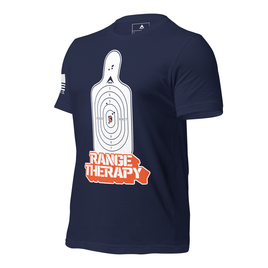 Navy blue t-shirt angled right featuring a white target graphic, orange "RANGE THERAPY" text, and white sleeve flag.