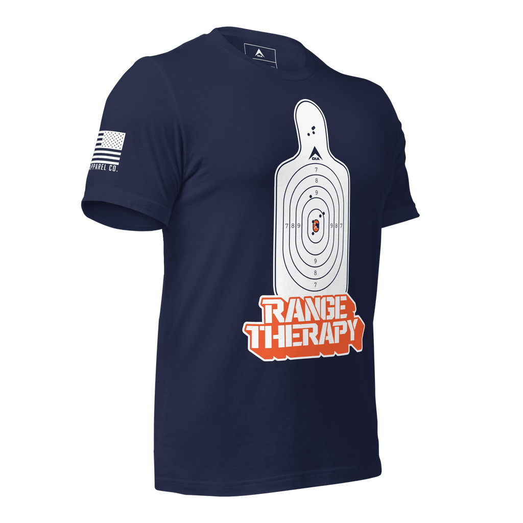 Navy blue t-shirt angled left featuring a white silhouette target, orange "RANGE THERAPY" text, and a white sleeve flag.