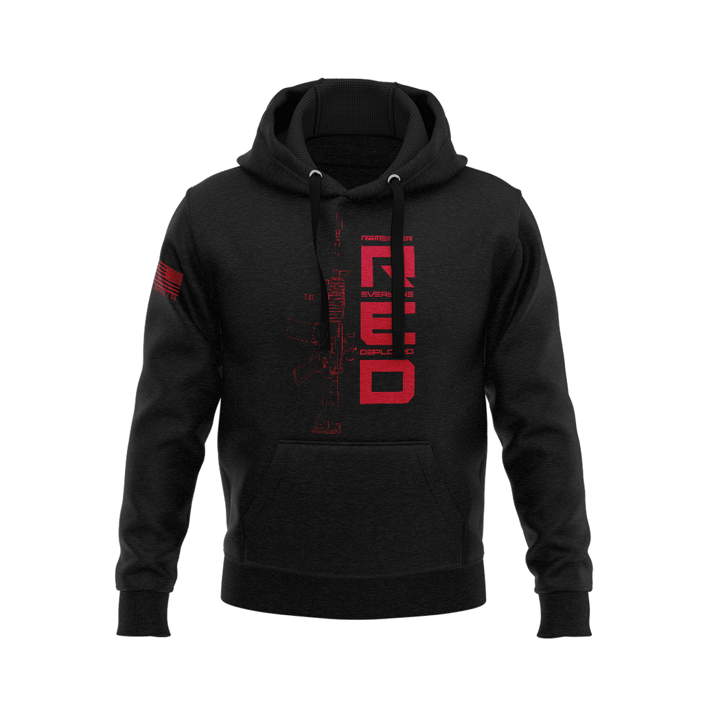 Black hoodie showcasing vertical red "RED" text, rifle outline chest graphic, and right sleeve American flag patch.